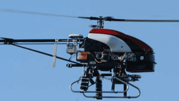 Learning Vehicular Dynamics, with Application to Modeling Helicopters