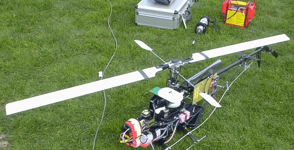 Autonomous Helicopter Tracking and Localization Using a Self-Calibrating Camera Array